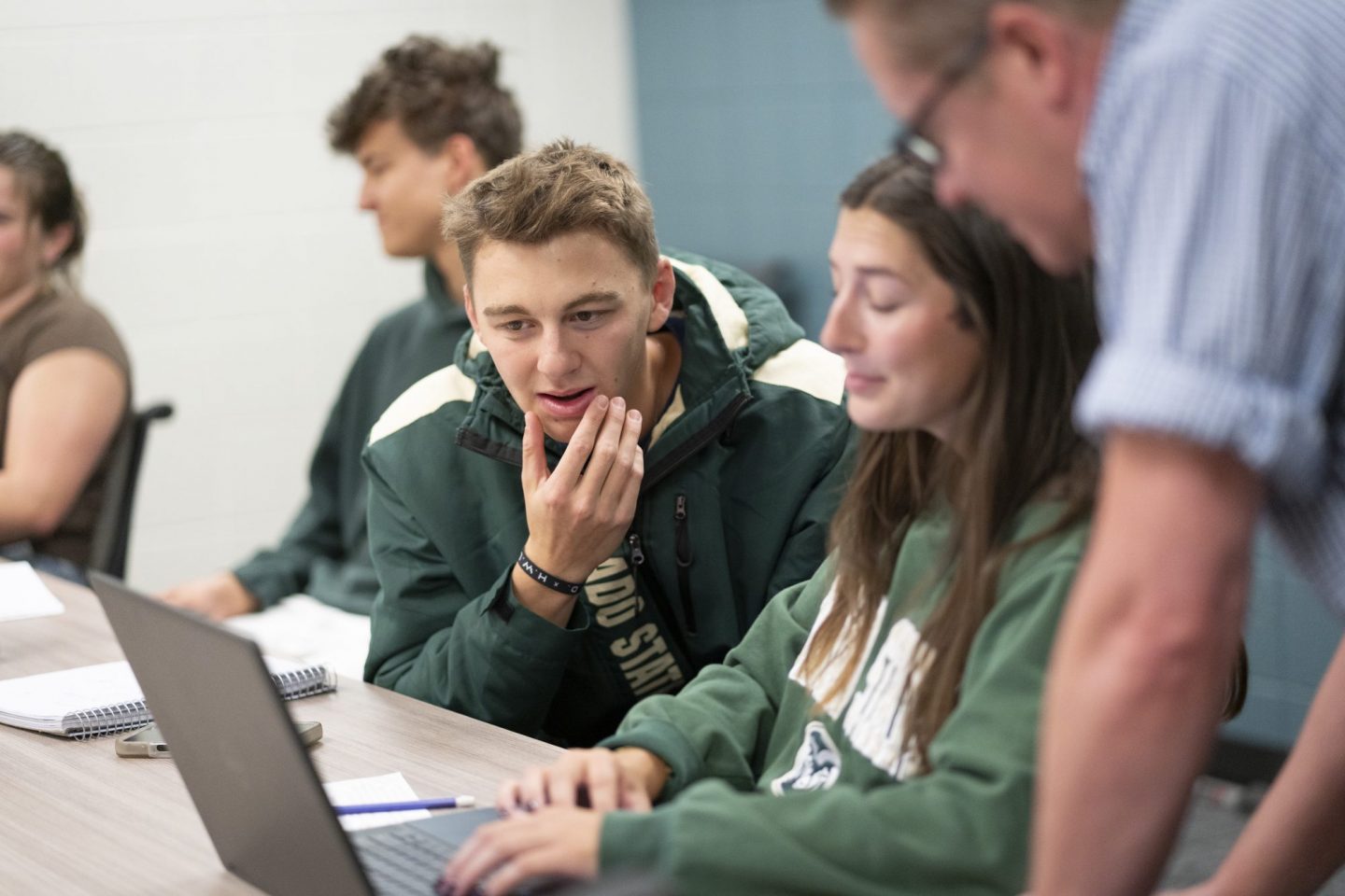 Students focusing hard on something during class