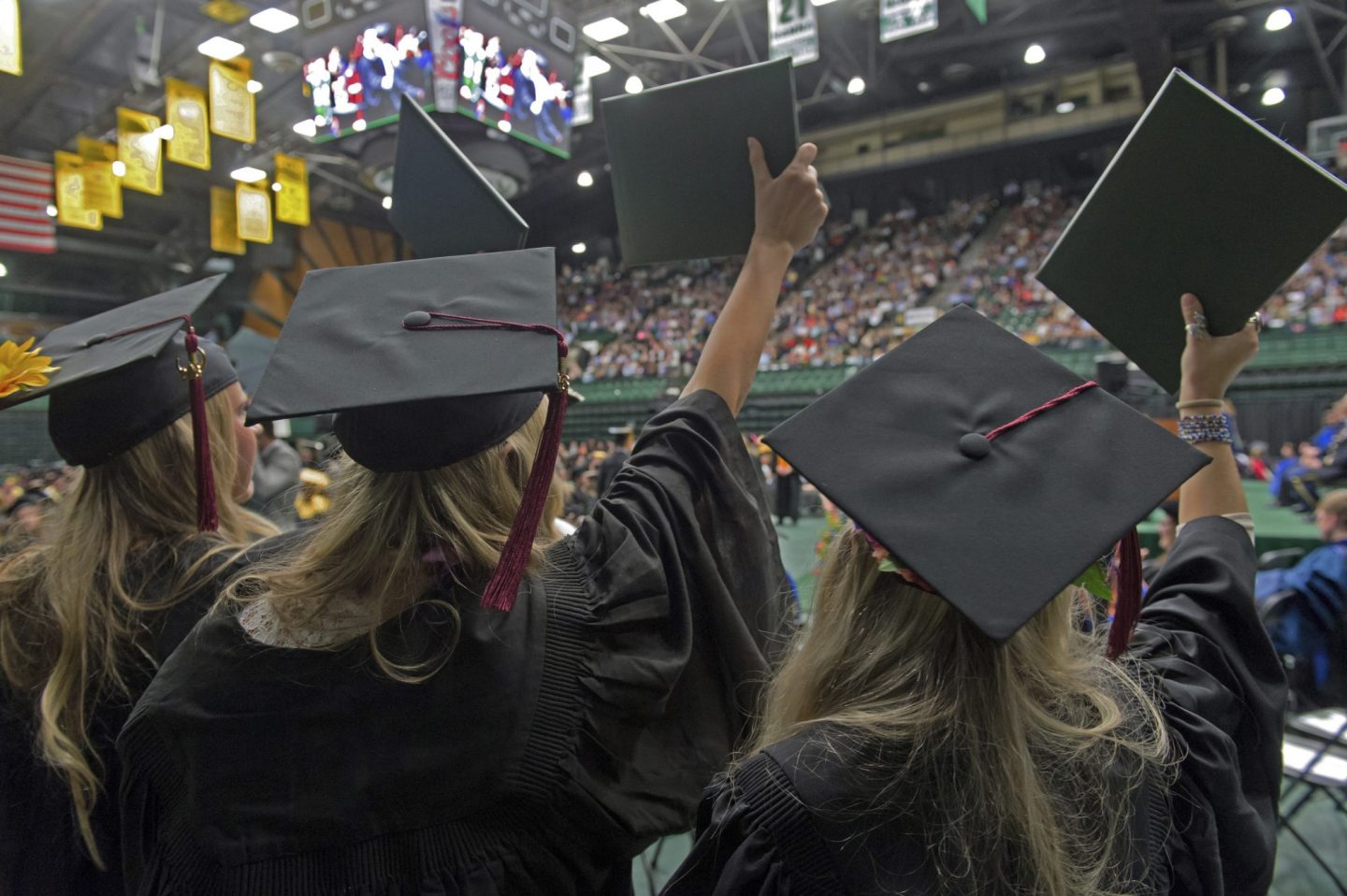 Students on graduate day in caps and gowns